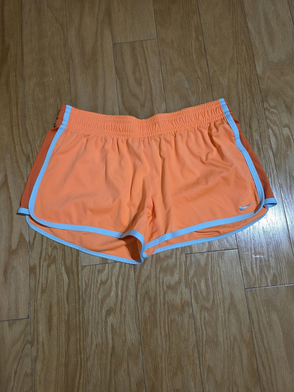 Nike Dri- Fit Athletic Women's Shorts Orange with Whit Stripes on the side Sz M